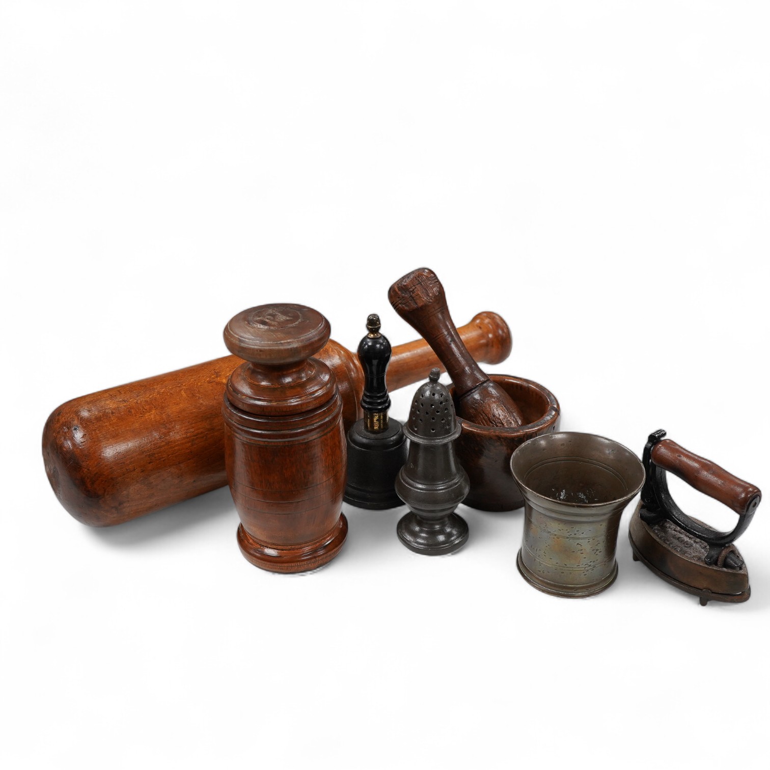 Sundry items to include a large pestle, spice grinder, flat iron on stand, bronze mortar and three other items, largest 42cm in length